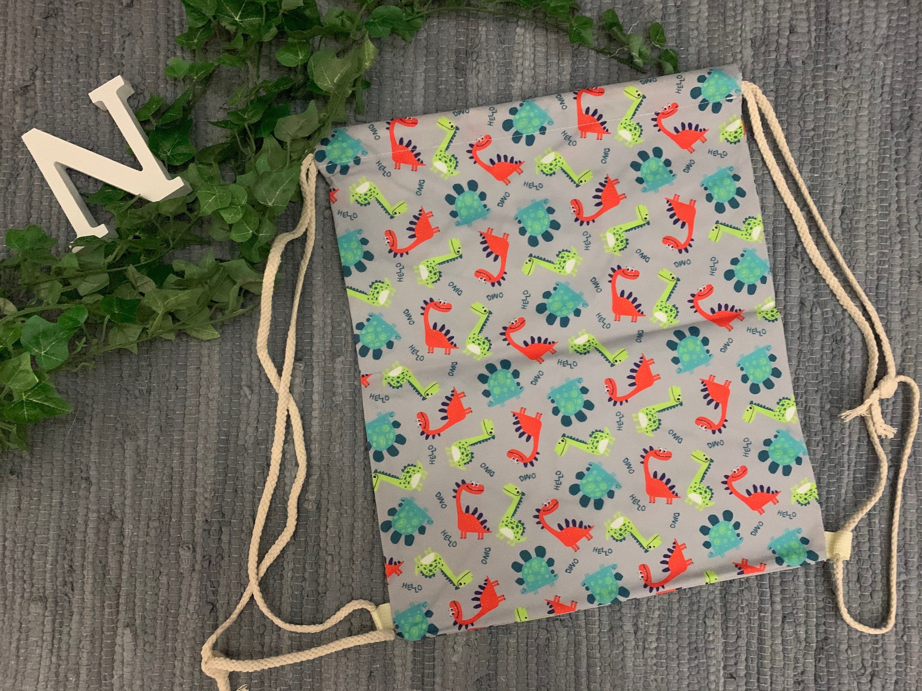 Turnbeutel/Sportbeutel Schule Einschulung Kind - kleine Dinosaurier