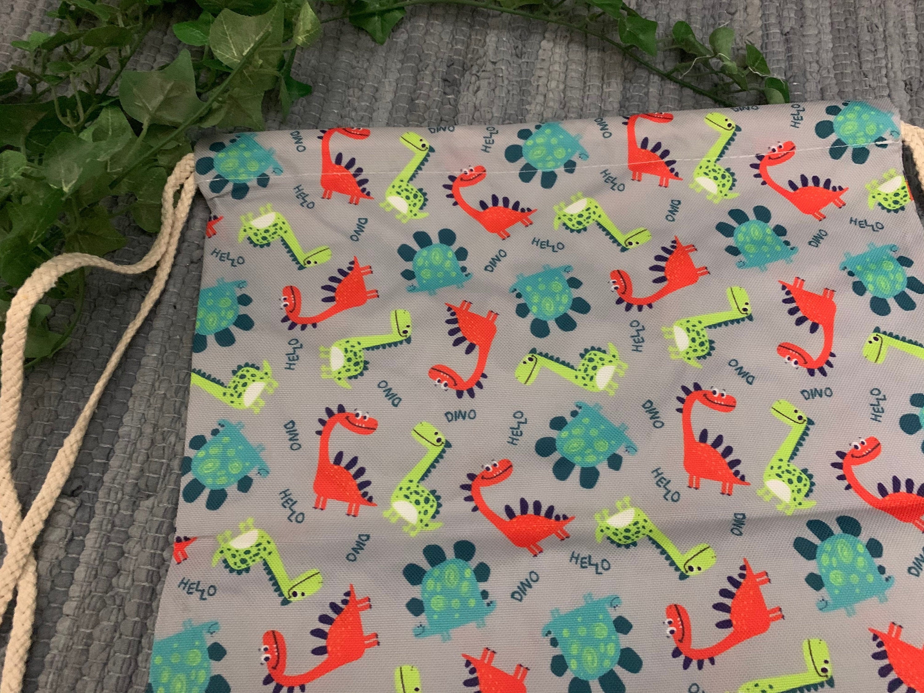 Turnbeutel/Sportbeutel Schule Einschulung Kind - kleine Dinosaurier